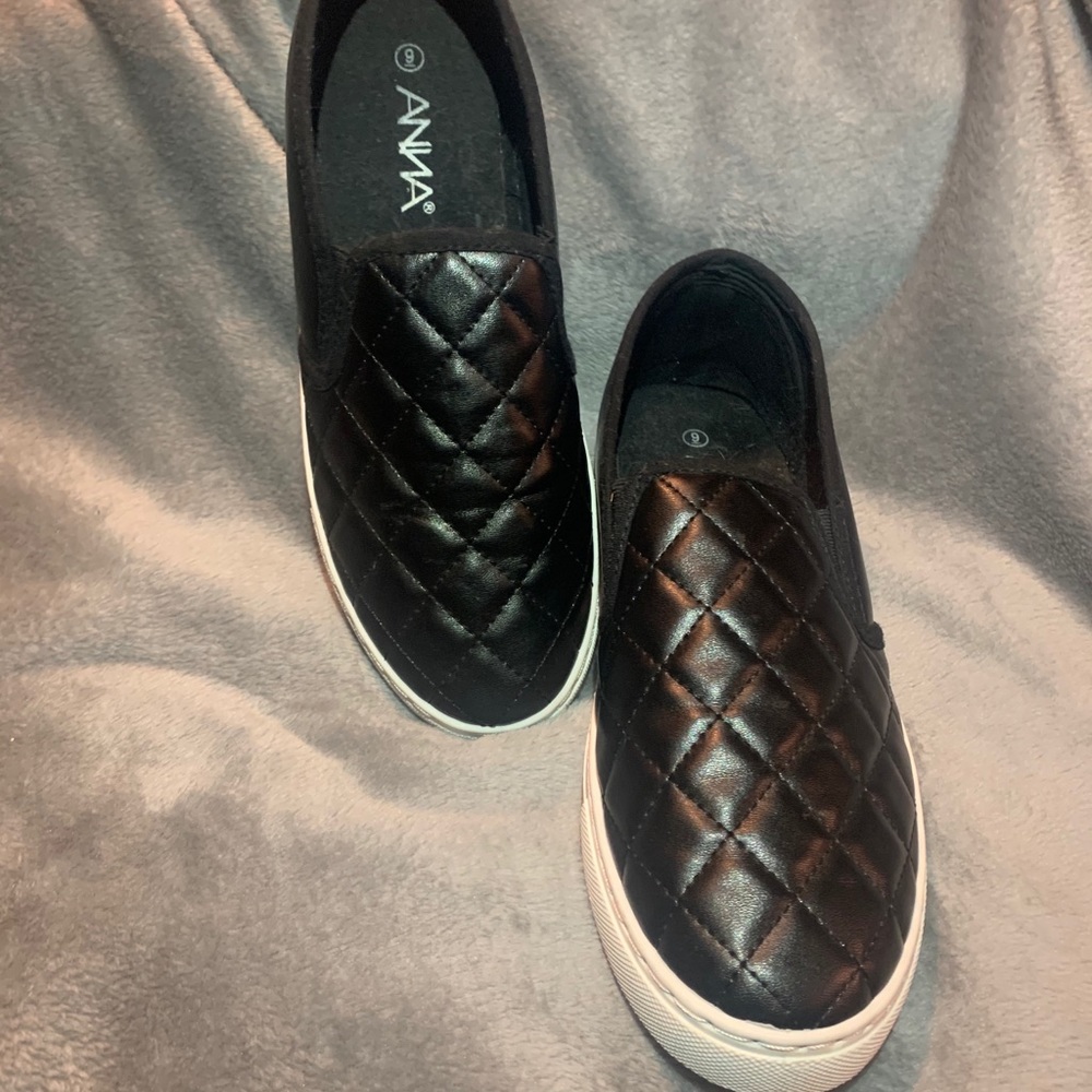 Black slip on tennis shoes